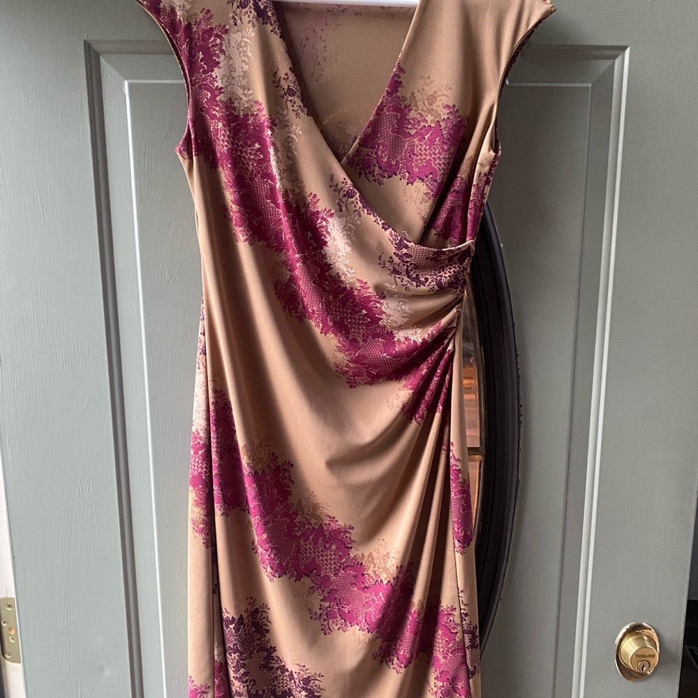 Adorable women’s dress! Size large but fits like a women’s medium.